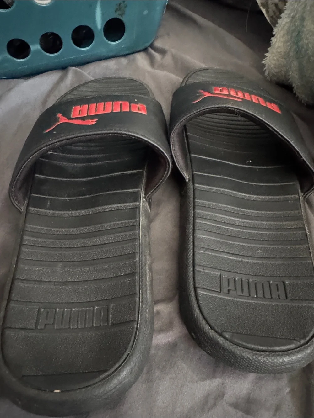 Puma Black Slides with Red Logo Accent
